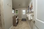 LOWER LEVEL BATHROOM 3 WITH WALK IN  SHOWER & DOOR TO THE OUTSIDE PATIO